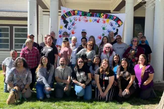 Fort Lyon Staff pose for photo on 10th anniversary